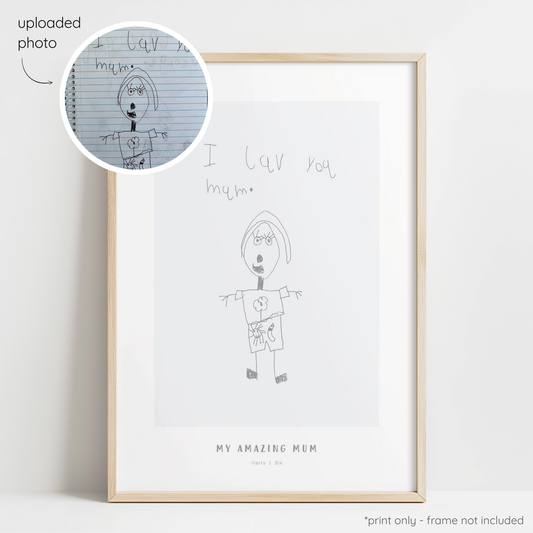 Framed dark grey abstract line art print of a child's drawing on a light grey background with a close-up inset of the original drawing.