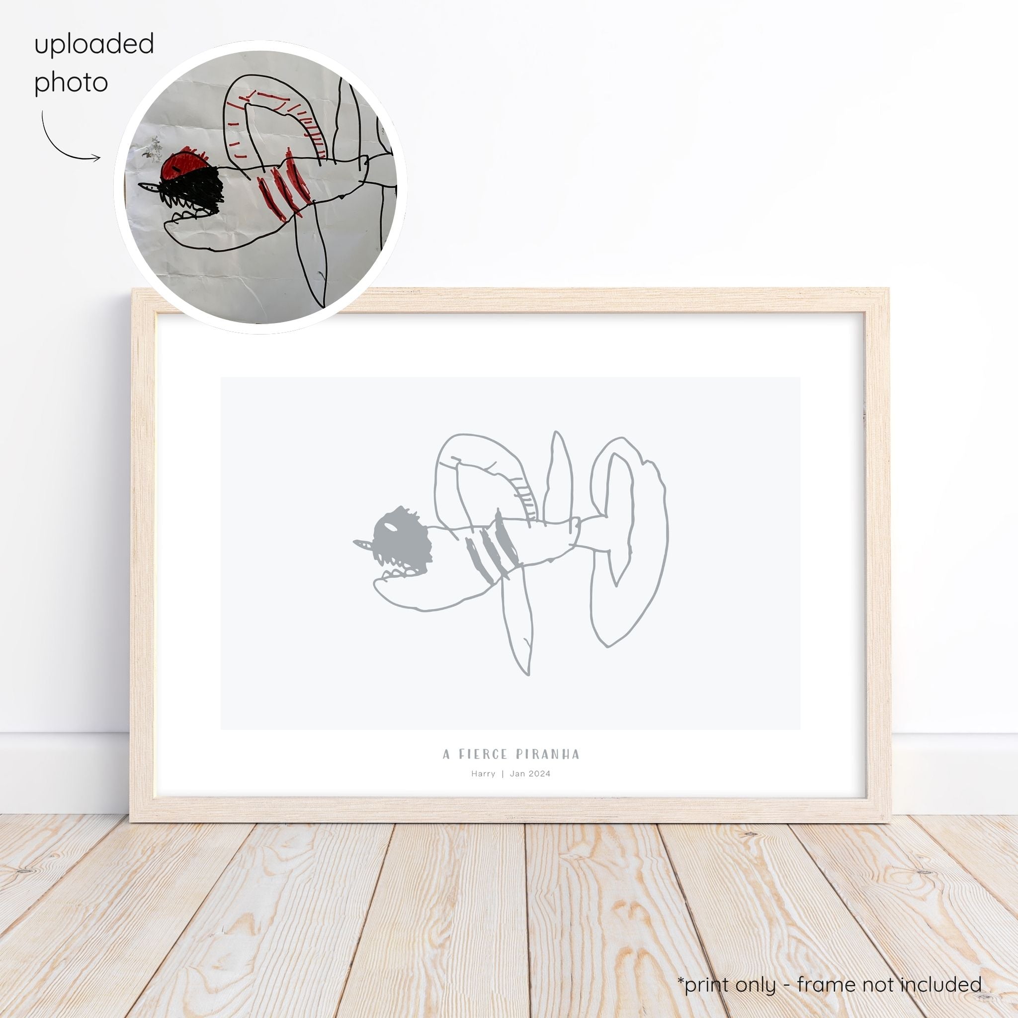 Framed dark grey abstract line art print of a child's drawing on a light grey background with a close-up inset of the original drawing.