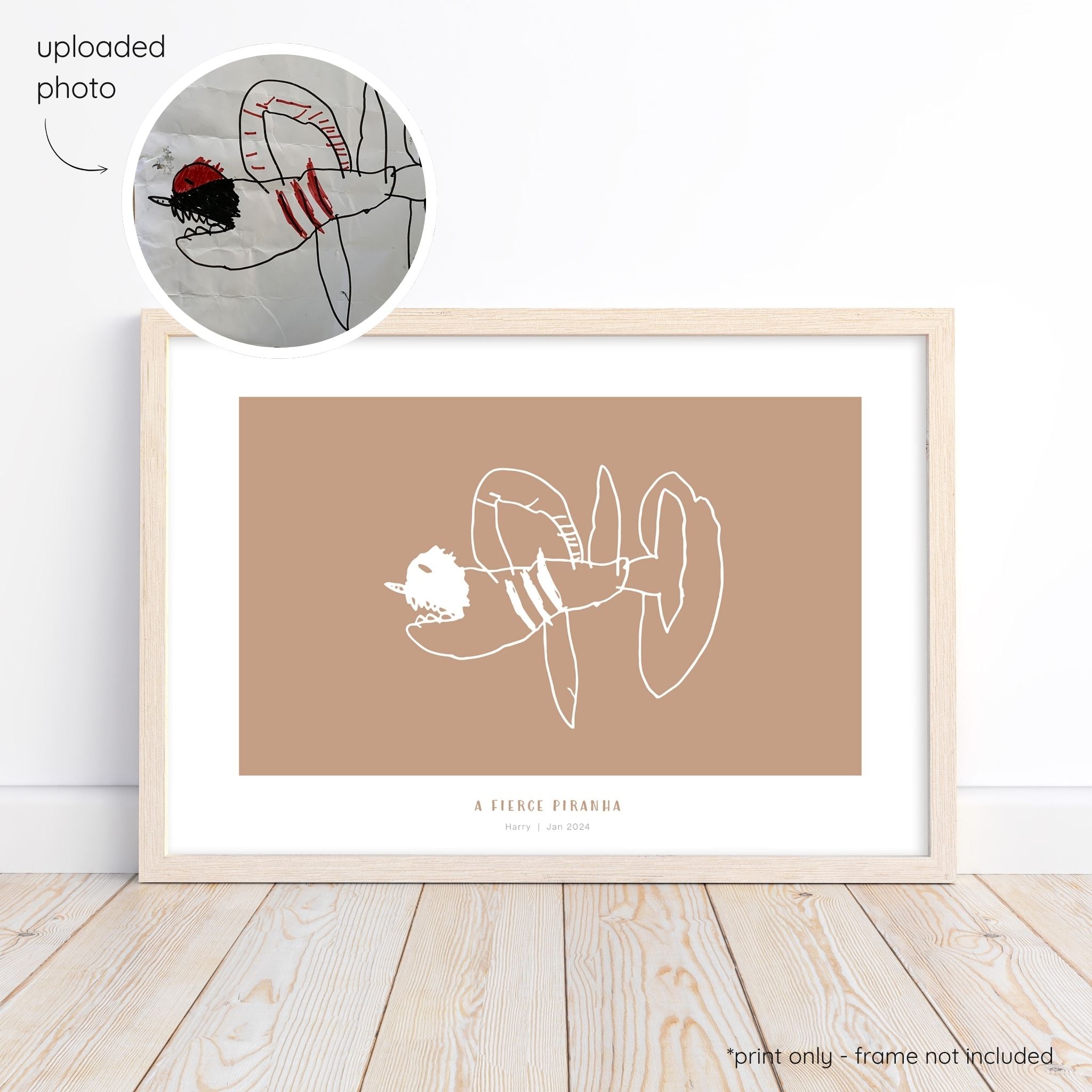 Framed white abstract line art print of a child's drawing on a terracotta background with a close-up inset of the original drawing.