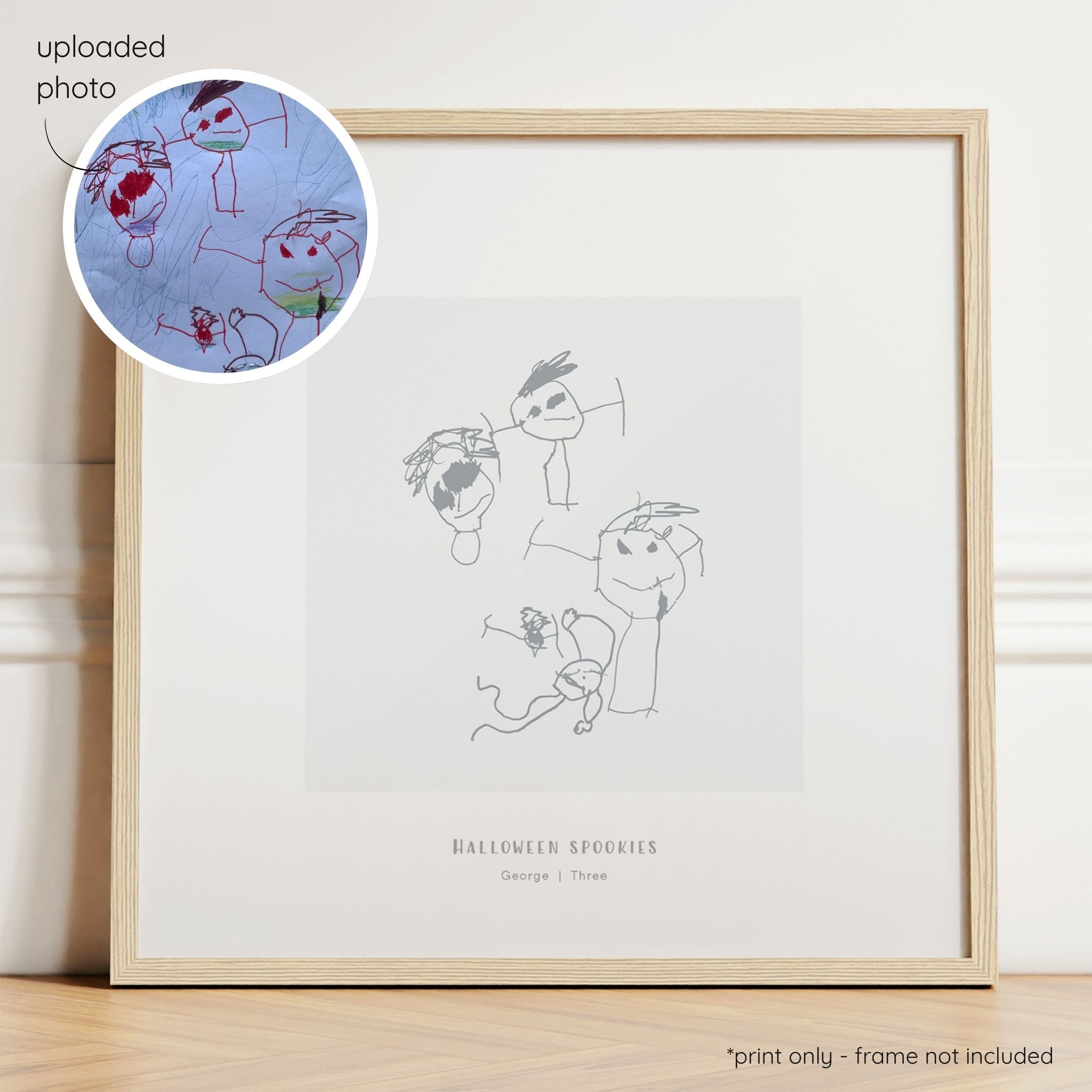 Framed dark grey abstract line art print of a child's drawing on a light grey background with a close-up inset of the original drawing.