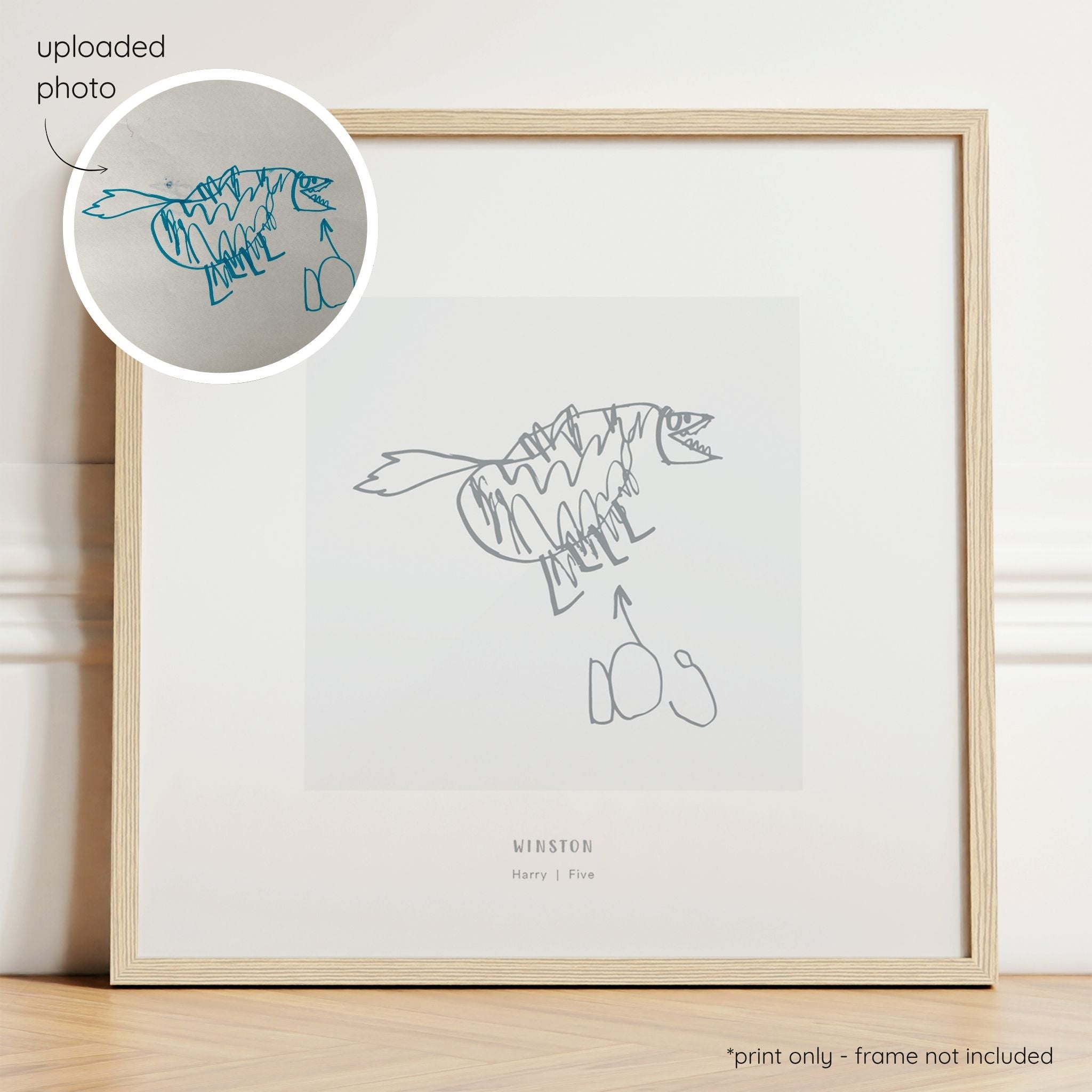 Framed dark grey abstract line art print of a child's drawing on a light grey background with a close-up inset of the original drawing.